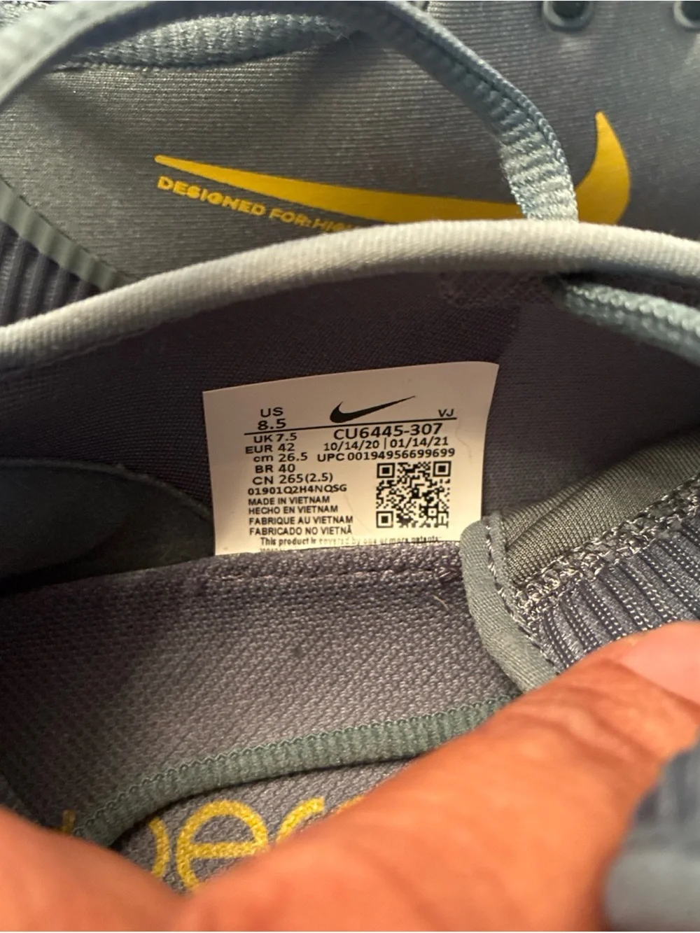 Nike Men’s Gray Athletic Shoes with Yellow Swoosh
